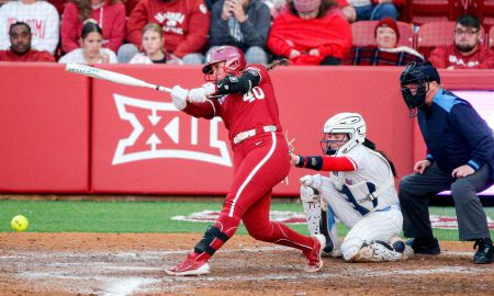 Oklahoma utility Alynah Torres (40) hits a single during an NCAA softball game between Oklahoma (OU) and Liberty on opening day of Oklahoma softball stadium Love's Field in Norman, Okla., on Friday, March 1, 2024.