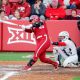 Oklahoma utility Alynah Torres (40) hits a single during an NCAA softball game between Oklahoma (OU) and Liberty on opening day of Oklahoma softball stadium Love's Field in Norman, Okla., on Friday, March 1, 2024.