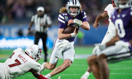 Dec 28, 2023; Orlando, FL, USA; Kansas State quarterback Avery Johnson (2) runs for the touchdown against NC State in the second quarter at Camping World Stadium. Mandatory Credit: Jeremy Reper-USA TODAY Sports