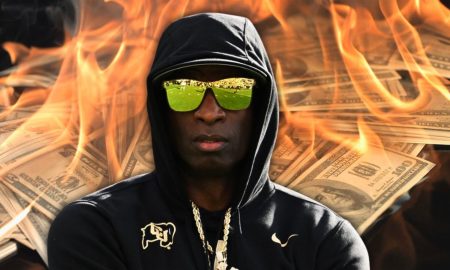 Deion Sanders with money burning behind him.