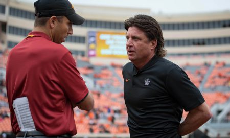 Oct 6, 2018; Stillwater, OK, USA; Iowa State Cyclones head coach Matt Campbell and Oklahoma State Cowboys head coach Mike Gundy (right) meet before a game at Boone Pickens Stadium. Mandatory Credit: Rob Ferguson-USA TODAY Sports