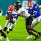 UCF Knights defensive back Corey Thornton (14) throws a face mask on Florida Gators quarterback Emory Jones (5). The Gators lead 10-9 over the Central Florida Knights at the half in the Gasparilla Bowl Thursday, December 23, 2021, at Raymond James Stadium in Tampa, FL. [Doug Engle/Ocala Star-Banner]2021