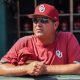 Jun 25, 2022; Omaha, NE, USA; Oklahoma Sooners head coach Skip Johnson looks over the field before the game against the Ole Miss Rebels at Charles Schwab Field. Mandatory Credit: Steven Branscombe-USA TODAY Sports