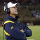 Sep 22, 2022; Blacksburg, Virginia, USA; West Virginia Mountaineers defensive coordinator Jordan Lesley watches from the bench during the second half against the Virginia Tech Hokies at Lane Stadium. Mandatory Credit: Reinhold Matay-Imagn Images