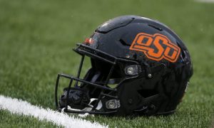 Nov 26, 2022; Stillwater, Oklahoma, USA; An Oklahoma State helmet is seen before a college football game between Oklahoma State and West Virginia at Boone Pickens Stadium in Stillwater, Okla., Saturday, Nov. 26, 2022. Mandatory Credit: Bryan Terry-USA TODAY Sports