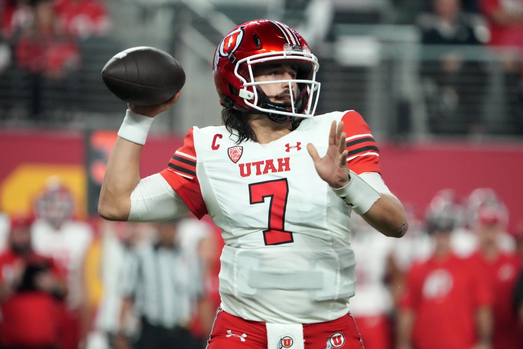 Dec 2, 2022; Las Vegas, NV, USA; Utah Utes quarterback Cameron Rising (7) throws the ball against the Southern California Trojans in the first half of the Pac-12 Championship at Allegiant Stadium. Mandatory Credit: Kirby Lee-USA TODAY Sports