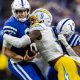 Dec 26, 2022; Indianapolis, Indiana, USA; Los Angeles Chargers linebacker Kenneth Murray Jr. (9) sacks Indianapolis Colts quarterback Nick Foles (9) in the first half at Lucas Oil Stadium. Mandatory Credit: Trevor Ruszkowski-USA TODAY Sports