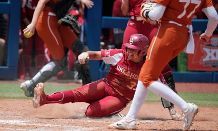 Oklahoma's Alyssa Brito (33) slides home to score a run in the fourth inning of the Big 12 softball tournament championship game between the University of Oklahoma Sooners (OU) and the Texas Longhorns at USA Softball Hall of Fame Stadium in Oklahoma City, Saturday, May 13, 2023. Oklahoma won 6-1.