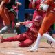 Oklahoma's Alyssa Brito (33) slides home to score a run in the fourth inning of the Big 12 softball tournament championship game between the University of Oklahoma Sooners (OU) and the Texas Longhorns at USA Softball Hall of Fame Stadium in Oklahoma City, Saturday, May 13, 2023. Oklahoma won 6-1.