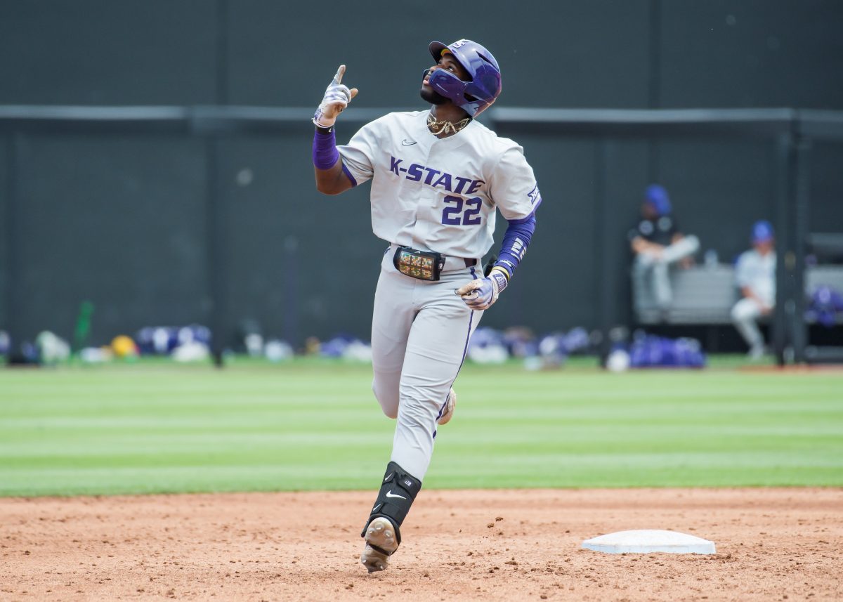 May 13, 2023; Stillwater, OK, USA; Kansas State Wildcats infielder Kaelen Culpepper (22) points up after hitting a home run during the game against the Oklahoma State Cowboys at O'Brate Stadium. Mandatory Credit: Brett Rojo-USA TODAY Sports