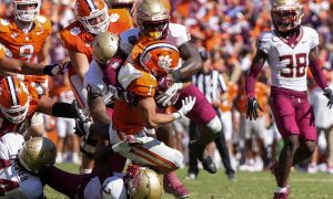 Sep 23, 2023; Clemson, South Carolina, USA; Clemson Tigers running back Will Shipley (1) is tackled by Florida State Seminoles linebacker Tatum Bethune (15) in the second half at Memorial Stadium. Mandatory Credit: David Yeazell-USA TODAY Sports