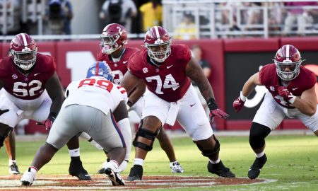 Sep 23, 2023; Tuscaloosa, Alabama, USA; Alabama Crimson Tide offensive lineman Tyler Booker (52) and Alabama Crimson Tide offensive lineman Kadyn Proctor (74) block against Mississippi at Bryant-Denny Stadium. Alabama defeated Mississippi 24-10. Mandatory Credit: Gary Cosby Jr.-USA TODAY Sports