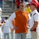 Oklahoma Sooners head coach Brent Venables, at right, and Texas Longhorns head coach Steve Sarkisian talk before the Red River Showdown college football game between the University of Oklahoma (OU) and Texas at the Cotton Bowl in Dallas, Saturday, Oct. 8, 2022.