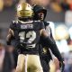 Oct 13, 2023; Boulder, Colorado, USA; Colorado Buffaloes wide receiver Travis Hunter (12) is congratulated for his touchdown by head coach Deion Sanders in the first quarter against the Stanford Cardinal at Folsom Field. Mandatory Credit: Ron Chenoy-USA TODAY Sports