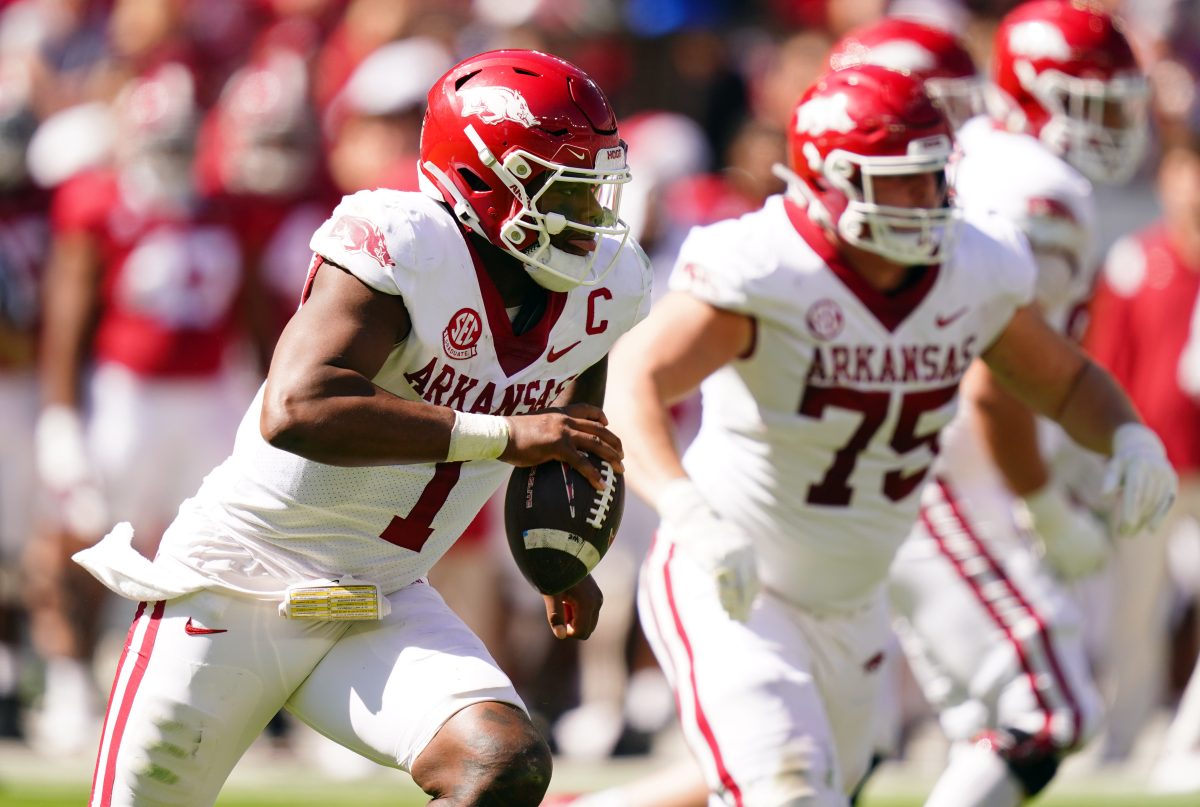 Oct 14, 2023; Tuscaloosa, Alabama, USA; Arkansas Razorbacks quarterback KJ Jefferson (1) rolls out during the fourth quarter against the Alabama Crimson Tide at Bryant-Denny Stadium. Mandatory Credit: John David Mercer-USA TODAY Sports