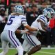 Oct 14, 2023; Lubbock, Texas, USA; Kansas State Wildcats quarterback Avery Johnson (5) hands the ball to running back DJ Giddens (31) in the first half during the game against the Texas Tech Red Raiders at Jones AT&T Stadium and Cody Campbell Field. Mandatory Credit: Michael C. Johnson-USA TODAY Sports