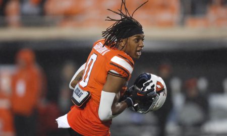 Oct 28, 2023; Stillwater, Oklahoma, USA; Oklahoma State Cowboys running back Ollie Gordon II (0) warms up before a game against the Cincinnati Bearcats at Boone Pickens Stadium. Mandatory Credit: Bryan Terry-USA TODAY Sports