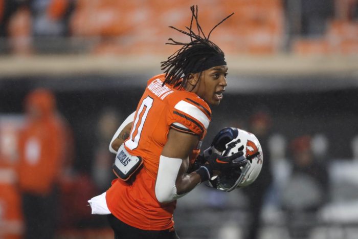 Oct 28, 2023; Stillwater, Oklahoma, USA; Oklahoma State Cowboys running back Ollie Gordon II (0) warms up before a game against the Cincinnati Bearcats at Boone Pickens Stadium. Mandatory Credit: Bryan Terry-USA TODAY Sports