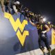 Nov 4, 2023; Morgantown, West Virginia, USA; West Virginia Mountaineers offensive lineman Zach Frazier (54) celebrates with fans after defeating the Brigham Young Cougars at Mountaineer Field at Milan Puskar Stadium. Mandatory Credit: Ben Queen-USA TODAY Sports