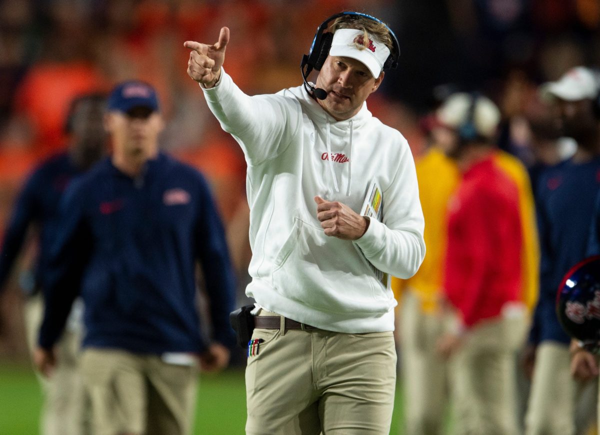 Mississippi Rebels head coach Lane Kiffin celebrates a pass interference call as Auburn Tigers take on Mississippi Rebels at Jordan-Hare Stadium in Auburn, Ala., on Saturday, Oct. 21, 2023. Mississippi Rebels defeated Auburn Tigers 28-21.