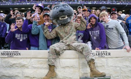 Nov 11, 2023; Manhattan, Kansas, USA; Kansas State Wildcats mascot Willie the Wildcat celebrates with fans during a game against the Baylor Bears at Bill Snyder Family Football Stadium. Mandatory Credit: Scott Sewell-USA TODAY Sports