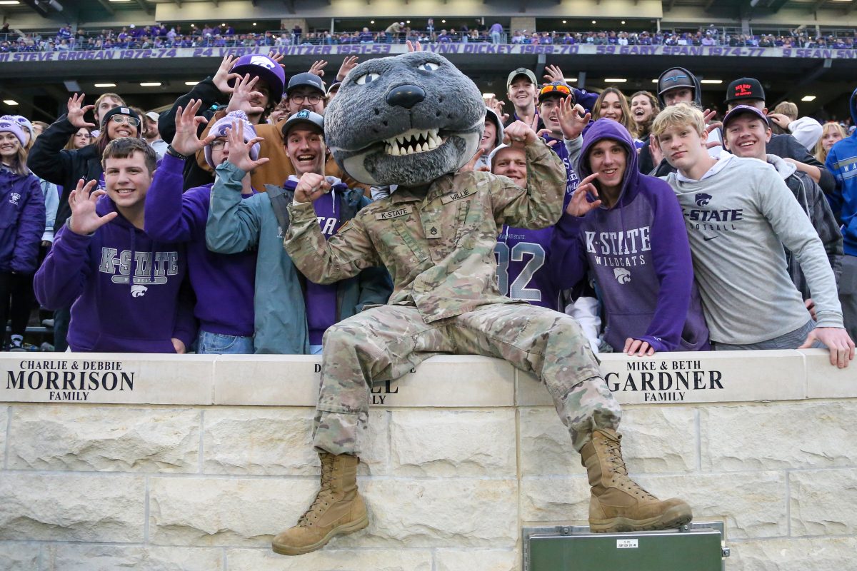 Nov 11, 2023; Manhattan, Kansas, USA; Kansas State Wildcats mascot Willie the Wildcat celebrates with fans during a game against the Baylor Bears at Bill Snyder Family Football Stadium. Mandatory Credit: Scott Sewell-USA TODAY Sports