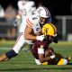 Nov 25, 2023; Tempe, Arizona, USA; Arizona Wildcats linebacker Jacob Manu (top) sacks Arizona State Sun Devils quarterback Jaden Rashada in the second half of the Territorial Cup at Mountain America Stadium. Mandatory Credit: Mark J. Rebilas-USA TODAY Sports