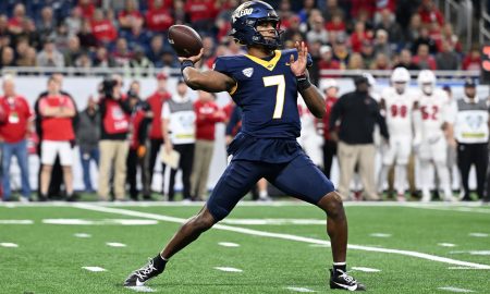 Dec 2, 2023; Detroit, MI, USA; Toledo Rockets quarterback Dequan Finn (7) throws a pass against the Miami (OH) Redhawks in the first quarter at Ford Field. Mandatory Credit: Lon Horwedel-USA TODAY Sports