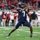 Dec 2, 2023; Detroit, MI, USA; Toledo Rockets quarterback Dequan Finn (7) throws a pass against the Miami (OH) Redhawks in the first quarter at Ford Field. Mandatory Credit: Lon Horwedel-USA TODAY Sports