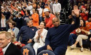 Former Auburn basketball player Charles Barkley acknowledges the crowd as Auburn Tigers take on USC Trojans at Neville Arena in Auburn, Ala., on Sunday, Dec. 17, 2023.