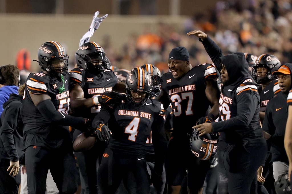 Oklahoma State's Nickolas Martin (4) celebrates an interception in the fourth quarter of the college football game between the Oklahoma State University Cowboys and the Kansas State Wildcats at Boone Pickens Stadium in Stillwater. Okla., Friday, Oct. 6, 2023. OSU won 29-21.