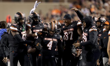 Oklahoma State's Nickolas Martin (4) celebrates an interception in the fourth quarter of the college football game between the Oklahoma State University Cowboys and the Kansas State Wildcats at Boone Pickens Stadium in Stillwater. Okla., Friday, Oct. 6, 2023. OSU won 29-21.