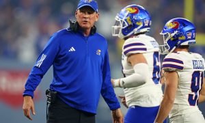 Dec 26, 2023; Phoenix, AZ, USA; Kansas Jayhawks head coach Lance Leipold looks on during the first quarter against the UNLV Rebels in the Guaranteed Rate Bowl at Chase Field. Mandatory Credit: Mark J. Rebilas-USA TODAY Sports