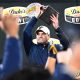 Dec 27, 2023; Charlotte, NC, USA; West Virginia Mountaineers head coach Neal Brown holds up the championship trophy after the game at Bank of America Stadium. Mandatory Credit: Bob Donnan-USA TODAY Sports