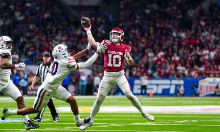 Dec 28, 2023; San Antonio, TX, USA; Oklahoma Sooners quarterback Jackson Arnold (10) avoids Arizona Wildcats defensive lineman Isaiah Ward (90) to throw for a touchdown in the first half at Alamodome. Mandatory Credit: Daniel Dunn-USA TODAY Sports