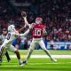 Dec 28, 2023; San Antonio, TX, USA; Oklahoma Sooners quarterback Jackson Arnold (10) avoids Arizona Wildcats defensive lineman Isaiah Ward (90) to throw for a touchdown in the first half at Alamodome. Mandatory Credit: Daniel Dunn-USA TODAY Sports