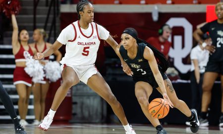 UCF Knights guard Kaitlin Peterson (3) moves around Oklahoma Sooners forward Kiersten Johnson (5) during the second half of an NCAA Women's Basketball game at Lloyd Noble Center in Norman, Okla., Saturday, Dec. 30, 2023. Oklahoma won 69-52.