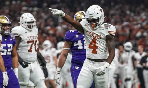 Texas Longhorns running back CJ Baxter (4) celebrates a first down during the Sugar Bowl College Football Playoff semifinals game against the Washington Huskies at the Caesars Superdome on Monday, Jan. 1, 2024 in New Orleans, Louisiana.