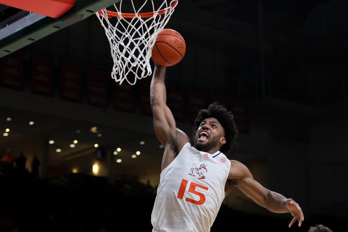 Mar 6, 2024; Coral Gables, Florida, USA; Miami Hurricanes forward Norchad Omier (15) dunks the basketball against the Boston College Eagles during the second half at Watsco Center. Mandatory Credit: Sam Navarro-USA TODAY Sports