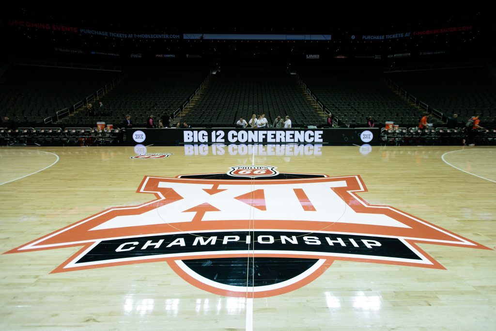 Mar 12, 2024; Kansas City, MO, USA; Big 12 Championship logo at center court prior to the game between the UCF Knights and the Oklahoma State Cowboys at T-Mobile Center. Mandatory Credit: William Purnell-USA TODAY Sports