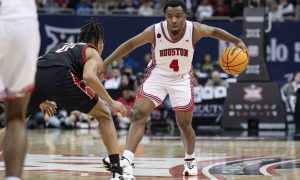 Mar 15, 2024; Kansas City, MO, USA; Houston Cougars guard LJ Cryer (4) controls the ball while defended by Texas Tech Red Raiders guard Chance McMillian (0) in the second half at T-Mobile Center. Mandatory Credit: Amy Kontras-USA TODAY Sports