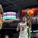 Cincinnati Bearcats guard Jizzle James (2) rises to the basket in the first half of a college basketball game against the San Francisco Dons in the National Invitation Tournament, Wednesday, March 20, 2024, at Fifth Third Arena in Cincinnati.