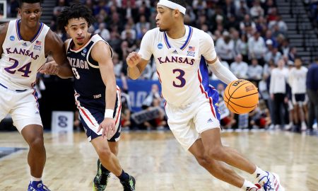 Mar 23, 2024; Salt Lake City, UT, USA; Kansas Jayhawks guard Dajuan Harris Jr. (3) drives against Gonzaga Bulldogs guard Ryan Nembhard (0) during the second half in the second round of the 2024 NCAA Tournament at Vivint Smart Home Arena-Delta Center. Mandatory Credit: Rob Gray-USA TODAY Sports