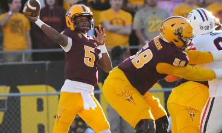 Arizona State quarterback Jaden Rashada (5) throws a pass against Arizona during the third quarter at Mountain America Stadium in Tempe on Nov. 25, 2023.