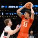 Mar 30, 2024; Boston, MA, USA; Illinois Fighting Illini forward Coleman Hawkins (33) attempts to dribble against the Connecticut Huskies in the finals of the East Regional of the 2024 NCAA Tournament at TD Garden. Mandatory Credit: Brian Fluharty-USA TODAY Sports