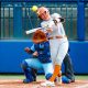 Texas utility Reese Atwood (14) hits a double during the Big 12 softball tournament game between the Texas Longhorns and the Kansas Blue Jays at USA Softball Hall of Fame Stadium in Oklahoma City, on Friday, May 12, 2023.