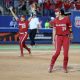 Oklahoma's Nicole May (19) and Alyssa Brito (33) celebrate after the Big 12 softball tournament championship game between the University of Oklahoma Sooners (OU) and Texas Longhorns at Devon Park in Oklahoma City, Saturday, May 11, 2024. Oklahoma won 5-1.