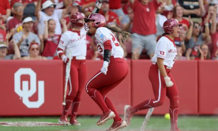 Oklahoma second baseman Tiare Jennings (23) celebrates after scoring a run in the third inning of a softball game between the Oklahoma Sooners (OU) and the Florida State Seminoles in Game 2 of the Norman Super Regional in the NCAA Tournament at Love's Field, Friday, May 24, 2024. Oklahoma won 4-2 to advance to the Women's College World Series.