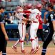 Oklahoma's Alyssa Brito (33), Tiare Jennings (23) and Jayda Coleman (24) celebrate as Duke's Ana Gold (4) and Dani Drogemuller (16) walk of the field following the Women's College World Series game between Alabama and UCLA at Devon Park in Oklahoma City, Thursday, May, 30, 2024.