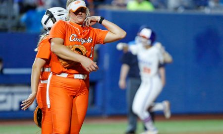 Florida outfielder Katie Kistler (29) celebrates behind Oklahoma State pitcher Lexi Kilfoyl (8) after hitting a home run in the fifth inning of a Women's College World Series softball game between the Oklahoma State Cowgirls and the Florida Gators at Devon Park in Oklahoma City, Thursday, May 30, 2024. Florida won 1-0.